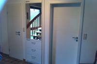 Zimmertür mit Weißlack und Drücker aus Edelstahl